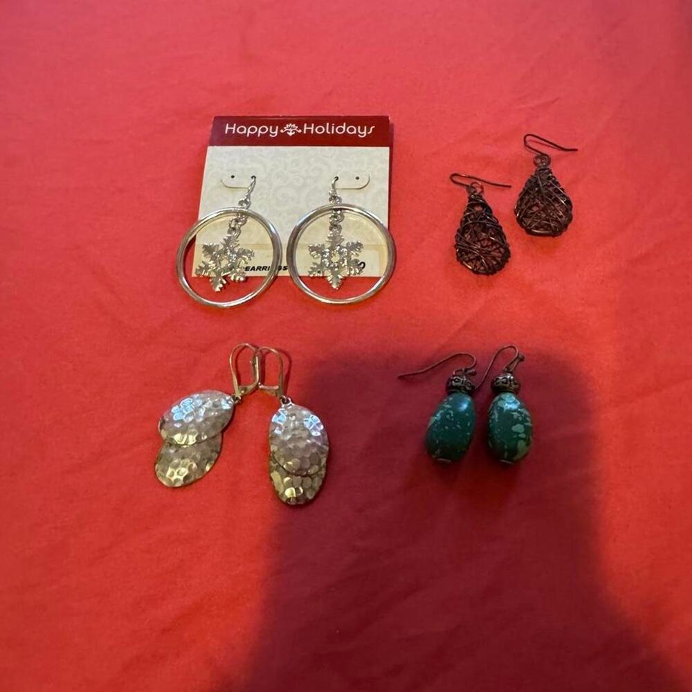 Bundle lot of 4 pairs of earrings. 1 brand new pair, 3 used pairs in great cond